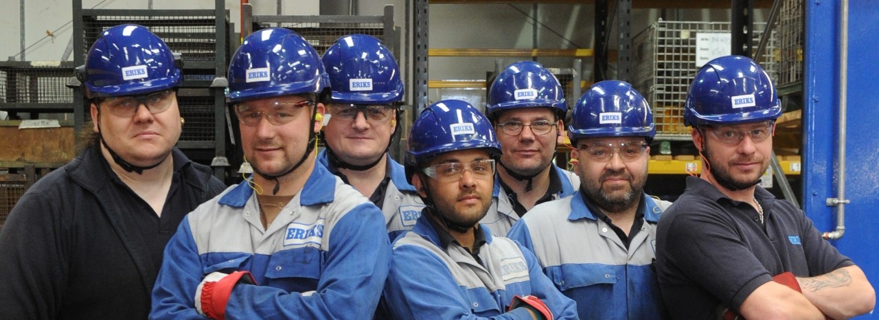 Employees in PPE Safety hats,Glasses and Gloves