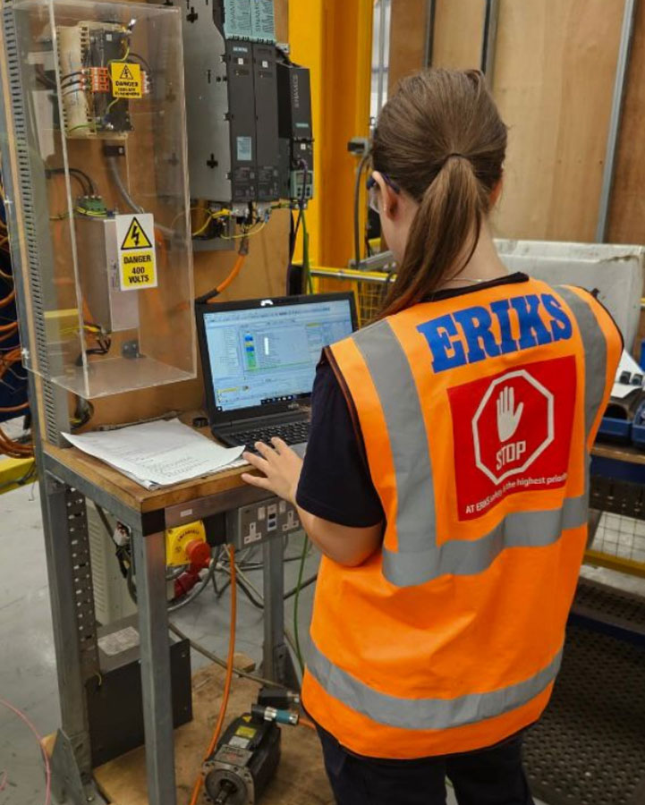 ERIKS Apprentice working on computer