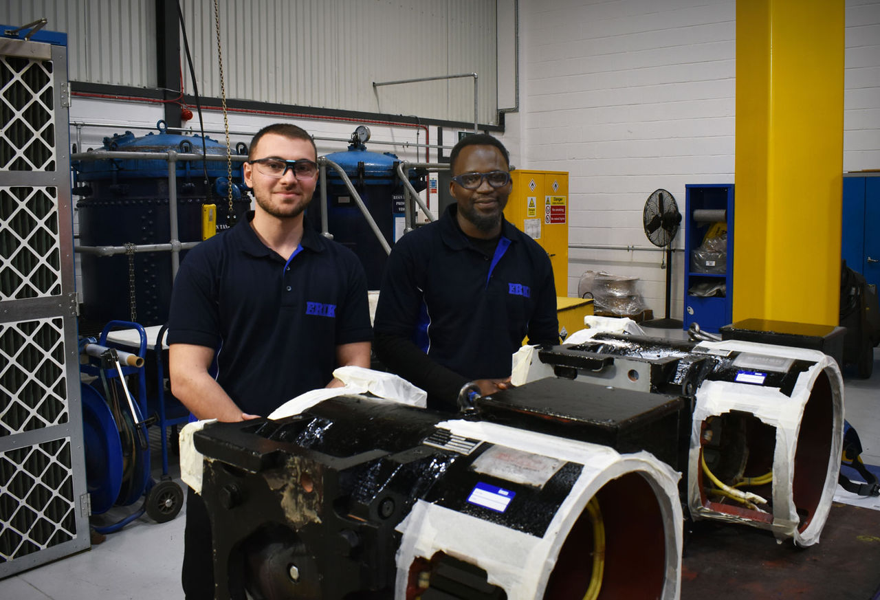 Two of the Greenford engineering team with product