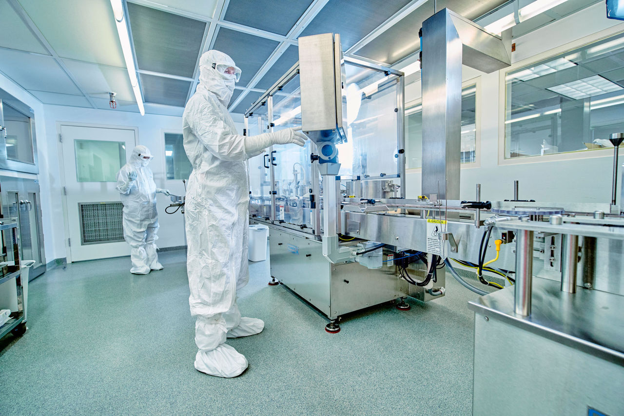 Person in full PPE in a cleanroom