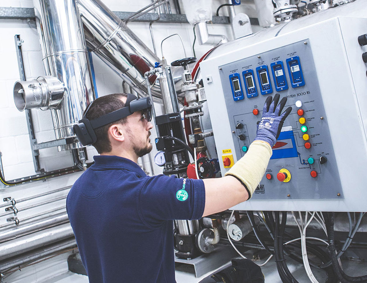 Service Engineer using Hololens Technology 5 Additional Engineer carrying out steam system audit