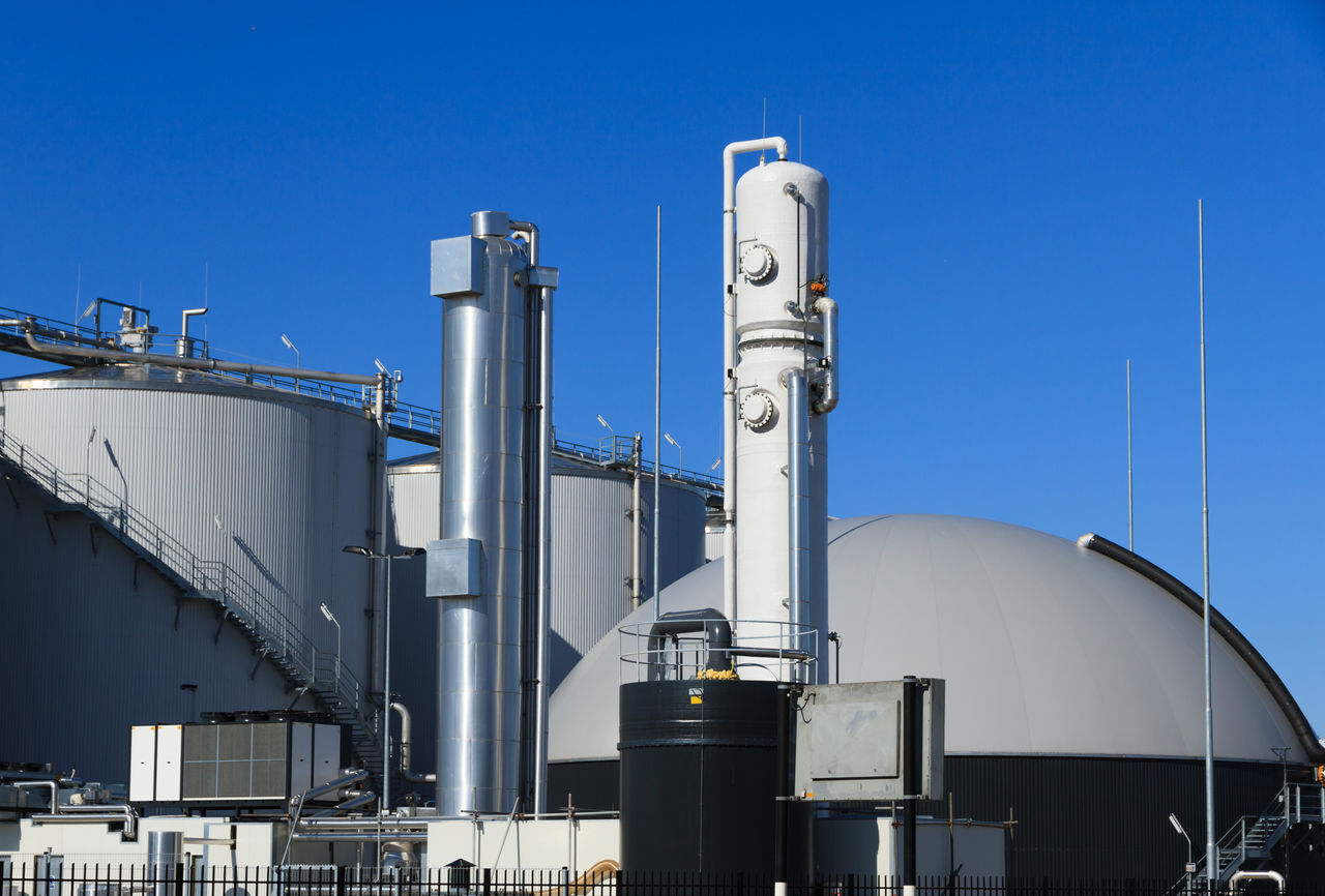 Bio gas plant Energy waste plant with a blue sky